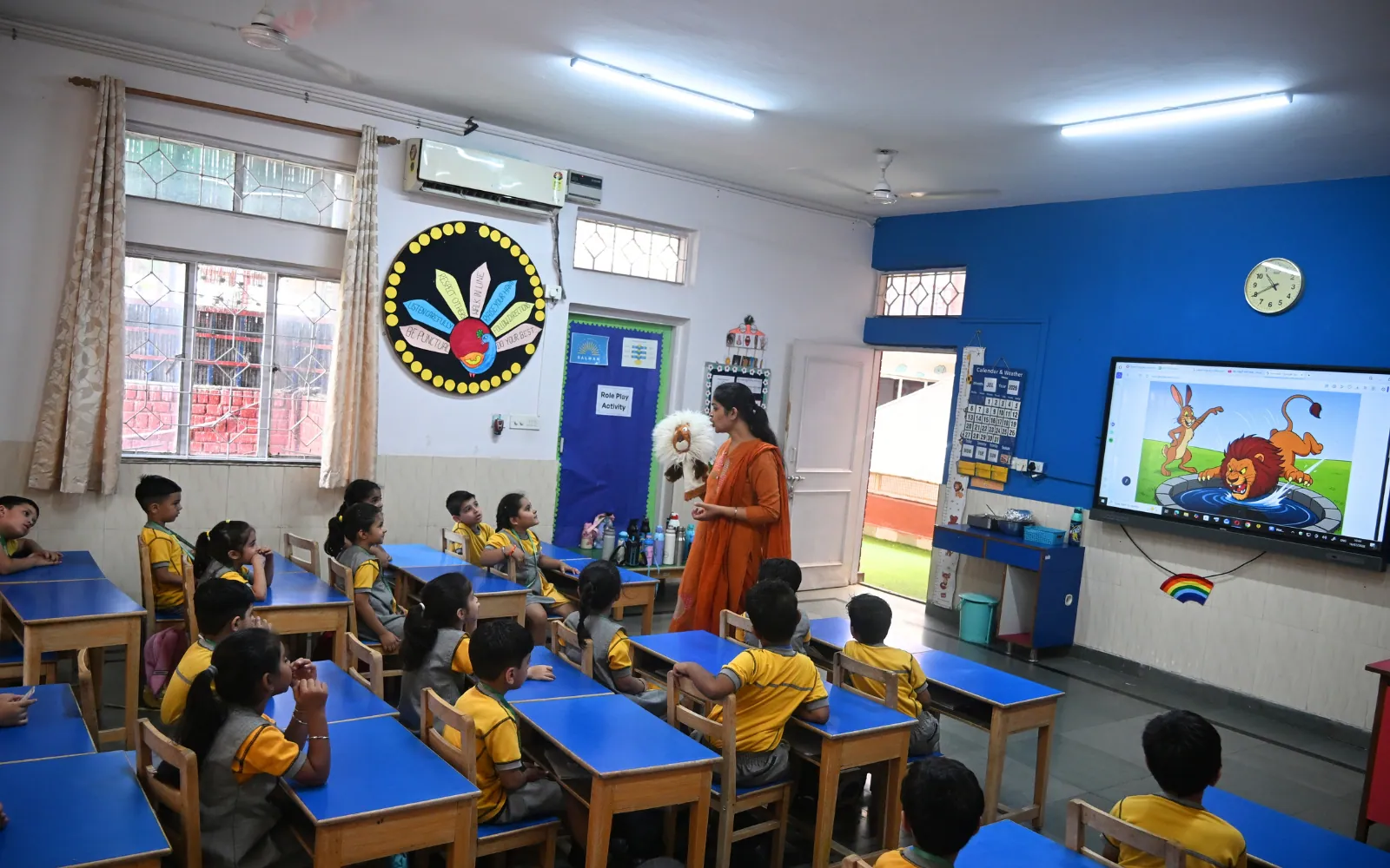 Young learners working in a bright interactive classroom